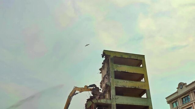 Old Building Demolition with Column Cutter Excavator Footage.