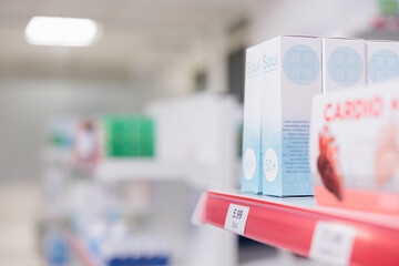 Health care shop shelves filled with packages of pills and modern medicine, containers of medicaments and supplements. Empty drugstore with drugs bottles and pharmaceutical products.