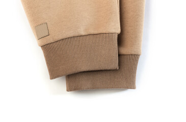 beige hoodie cuffs isolated on a white background 