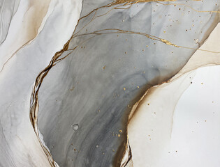Abstract brown art with gold and gray — beige background with golden paint. Beautiful smudges and...