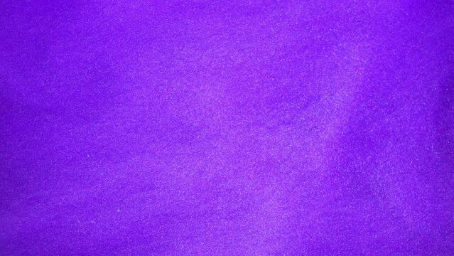 Very peri, purole Shiny Abstract Background. Paints, Acrylic, Glitter in Water. Very peri Shiny Liquid Surface, Ripples, Waves.