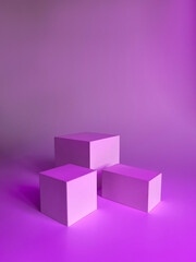 Obraz premium Abstract empty pink podium on a pink background.Mockup of products for skin or hair care. Studio photo