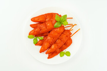 Chicken fillet inner skewers.Chicken fillet inner skewers.Food concept.Fresh raw marinated chicken meat skewers iner fillet on a white background.Top view.Copy space.
