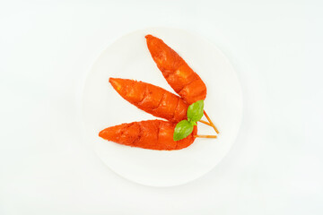 Fresh raw marinated chicken meat skewers iner fillet on a white background.Top view.Copy space.Closeup of chicken meat.Chicken breast inner Fillets.Marinated Chicken skewers fillet meat.