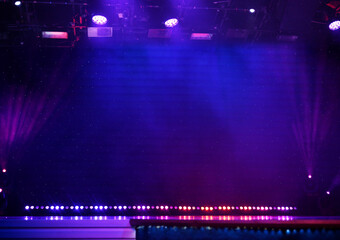 Fototapeta Elegant theater stage with purple lights and smoke obraz