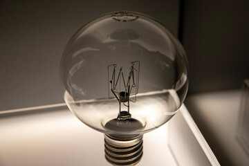 Vintage light bulb. Detail. Energy.