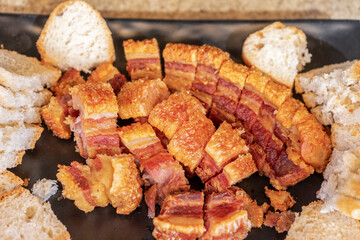 TORREZNOS DISH FROM SORIA, SPAIN. TYPICAL SPANISH FOOD OF FRIED PORK BACON.