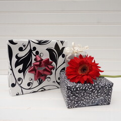 Black and White Gift Boxes with Red Gerbera Daisy
