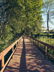 Fototapeta na wymiar Wooden pathway in Lobao, Santa Maria da Feira - Portugal.