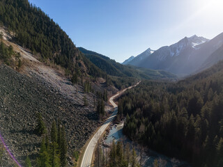 Aerial View of Duffey Lake Road from Lillooet to Pemberton, British Columbia, Canada. Scenic Highway in the Mountain Valley Landscape. Sunny Sunset