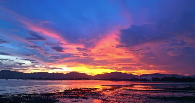 
aerial view reflection of colorful cloud in bright sky of sunset above the ocean at Khao Khad Phuket. 
Majestic sunset or sunrise landscape Amazing light of nature background. 
fantastic sky texture.