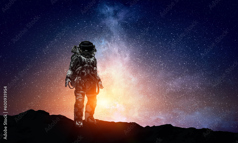 Poster astronaut walking on an unexplored planet