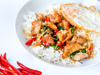 Rice topped with crispy pork belly with Thai basil and fried egg