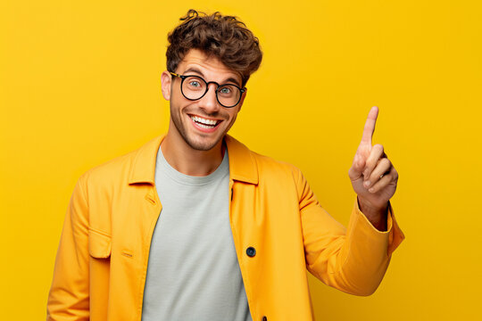 Enthusiastic Man Portrait: Joyful Winner with Dynamic Poses and Excitement, Trending Model Smiling and Emotionally Gesturing on Colorful Design Background