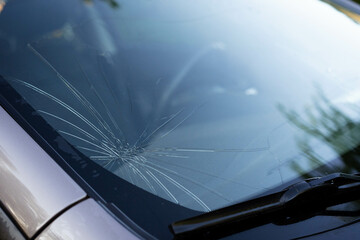 broken car windshield, chipped and damaged car glass, copy space