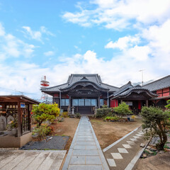 Nakatsu, Japan - Nov 26 2022: Goganji Temple (Red Wall Temple) established by daimyo Kuroda Yoshitaka and founded by the priest Kuyo, situated a little south of the center of the Tera-machi district