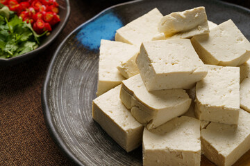 Ingredients required for fried stinky tofu on a monochrome background