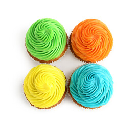 Tasty colorful cupcakes on white background