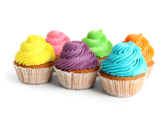 Tasty colorful cupcakes on white background