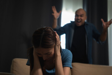 Relationships problems conflicts in marriage. Depressed stressed violence young couple man and woman Argument fighting shouting in the house. Making decision of breaking up get divorced. Harassment