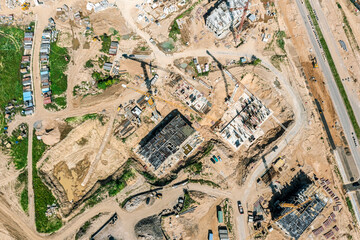 construction site with machinery, equipment and materials. early stage of construction. shot from above.