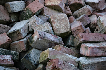 pile of old white bricks used before, construction trash background.