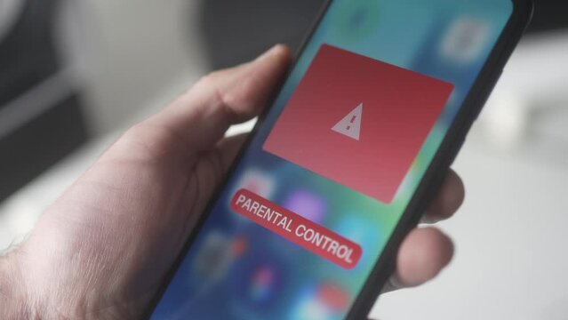 Parental Control Lock on a Mobile Phone Smartphone Screen Closeup