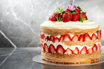 Victoria Sponge Cake with delicious Chantilly cream and fresh strawberries