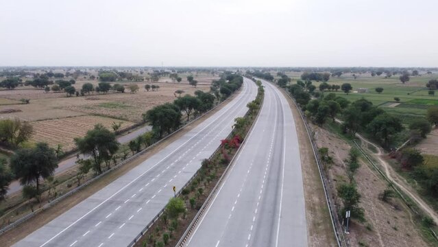 Aerial drone revealing shot of Yamuna Expressway connecting Delhi to Agra via Noida, India