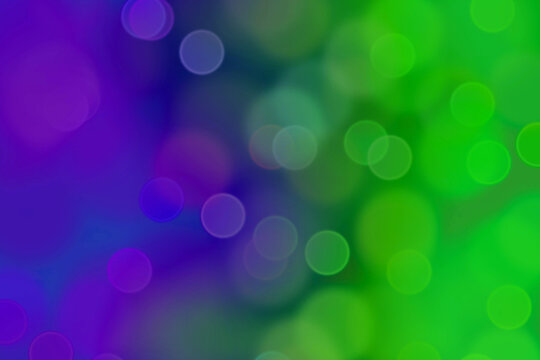 Blue and green bright lights background with bokeh effect, bright abstract background with circles, contemporary design with bright sparkles.