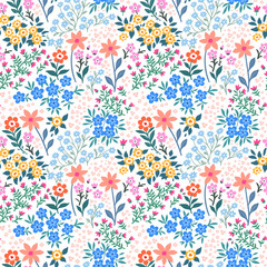 Seamless pattern. Romantic abstract floral pattern on a light background. Illustrations of spring nature with red, blue, pink, yellow and orange flowers.