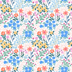Seamless pattern. Romantic abstract floral pattern on a light background. Illustrations of spring nature with red, blue, pink, yellow and orange flowers.