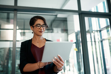 Work, planning and a woman with a tablet for project management, research and ideas on the...