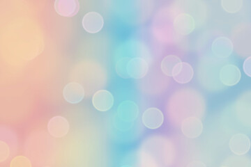 Fototapeta premium Bokeh background, flashes of lights, with shades of warm colors like lilac, light blue, pink, orange and so on. Background with beautiful flashes of lights. Celebration concept, bokeh blur, overlay. 