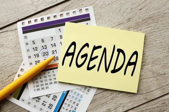 Agenda text on yellow letterhead on calendar