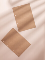 Blank sheets of paper on a light background.