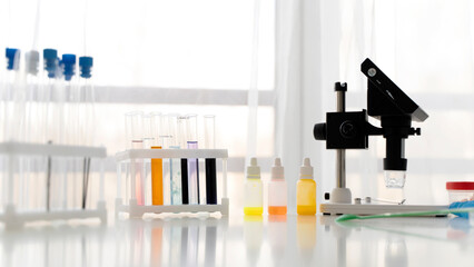 microscope and test tubes in a chemical laboratory