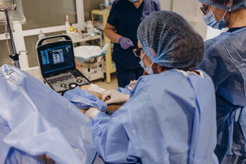 surgery for varicose veins of the legs in a modern operating room