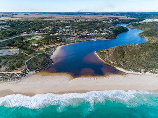 Aerial view of where the river meets the sea in Guilderton, Western Australia, Australia. Beach,...
