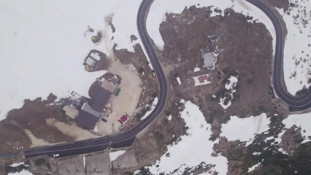 Mountain road on the peak zenithal 4K drone