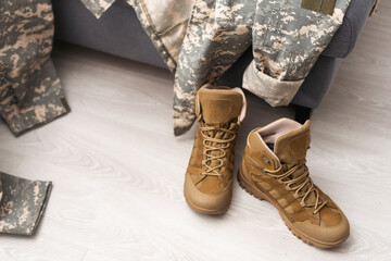 military camouflage uniforms and boots