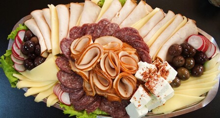 Plate of mixed meats and cheeses
