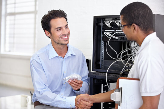 Server room, it support and handshake with an engineer talking to a business man about cyber security. Network, database and contract agreement with a technician chatting about information technology