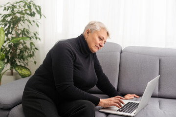 old woman does online shopping