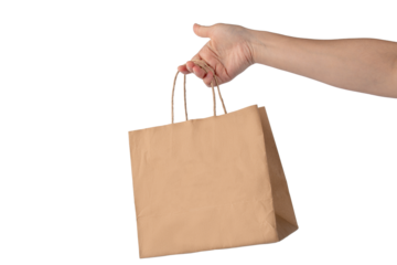 Hand Holding Paper Bag isolated on transparent background.