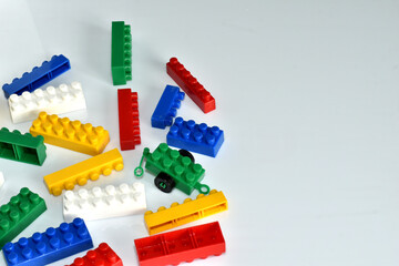 Bright details of the children's designer are scattered on the table.