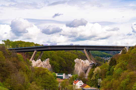 Blasting of german motorway bridge &ldquo;Talbr&uuml;cke Rahmede&ldquo; on the famous &ldquo;Sauerlandlinie&ldquo; (A45) near L&uuml;denscheid in Northrhine Westphalia. Moment of ignition and loud collapse of concrete pillars.