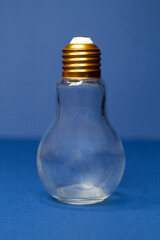 Glass lamp on a blue background