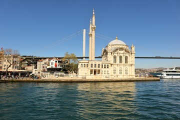 Fototapeta na wymiar Istanbul, Turkey, 05.02.2023: The Ortakoy Mosque on marmara sea. Sea of Marmara between the European side and the Asian side