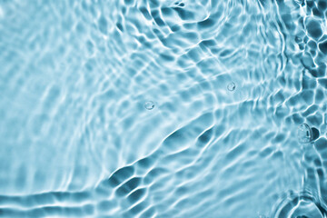Blue water wave background top view. Abstract water drops texture for design.